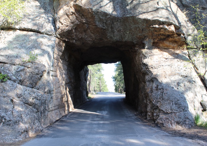 mount rushmore framed by tunnel