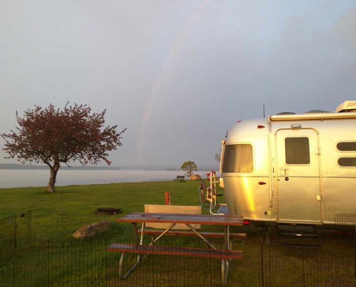 airstream rainbow by river