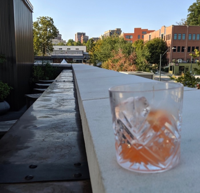 cocktail on rooftop at Antidote