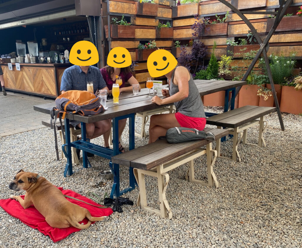 drinks and dog on the patio at the Funkatorium