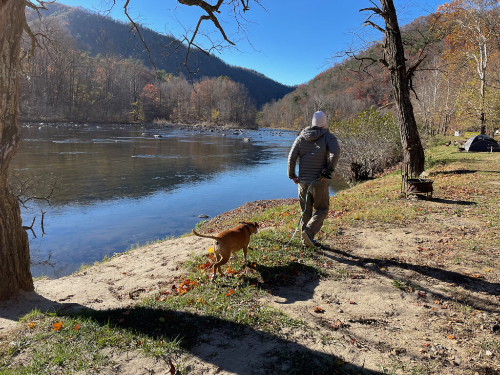 walking along the Nolichucky River at the campground