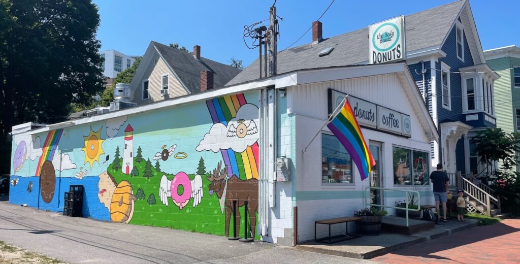 mural on the side of Holy Donut