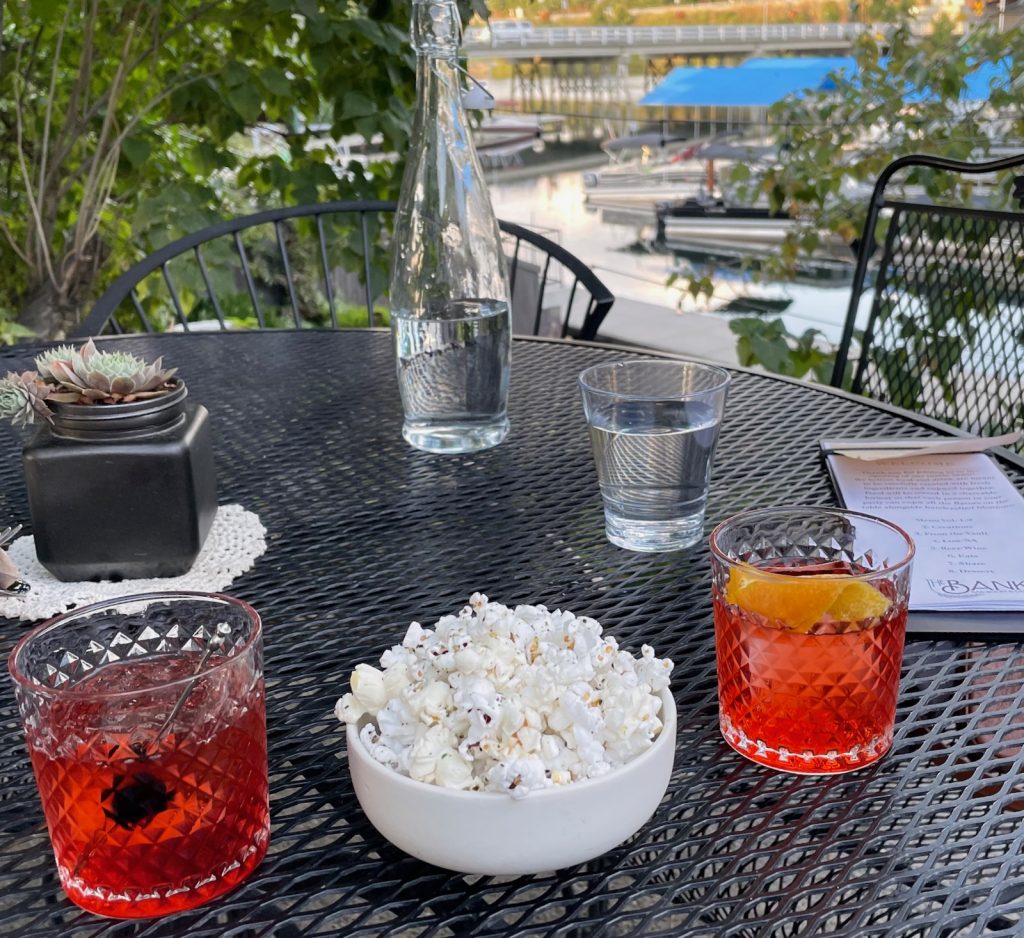 cocktails and popcorn with a marina view at The Bank
