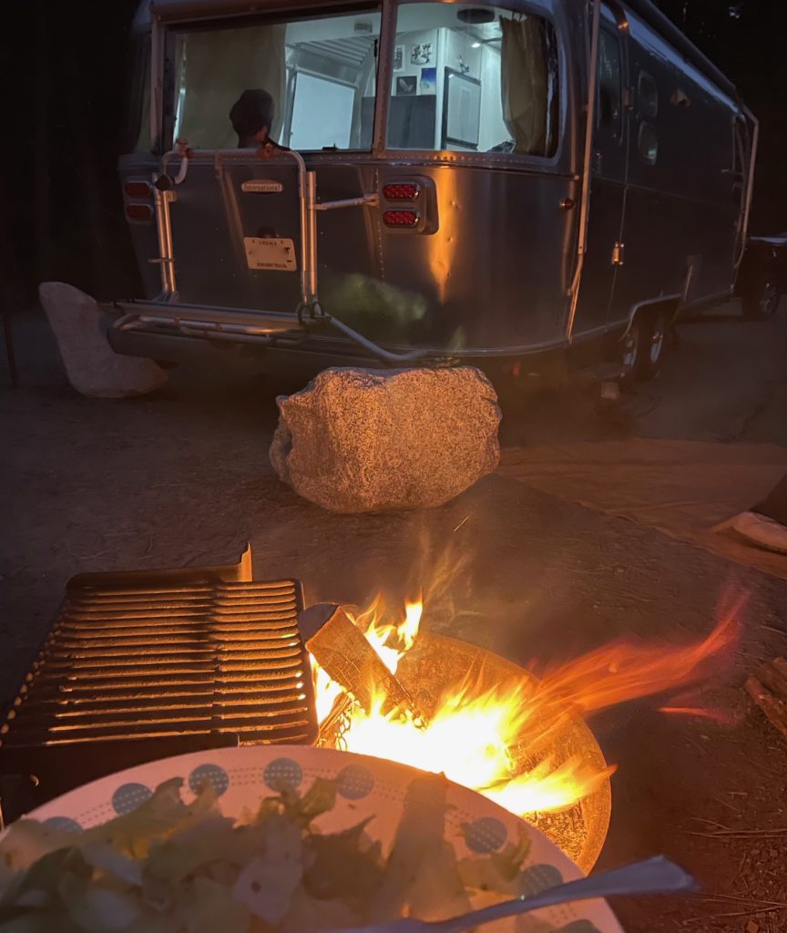 dinner by the campfire and the airstream