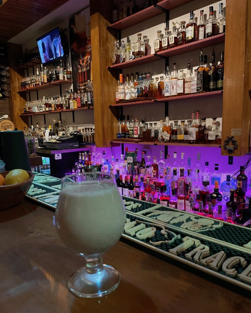 a cocktail at the bar at The Whisky Lounge