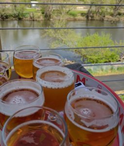 tasting flight by the river at new belgium