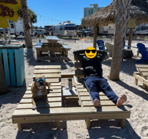 relaxing on the beach at Pensacola Beach RV Resort