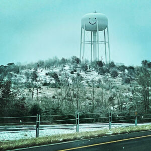snowy roadside water tower in Texas