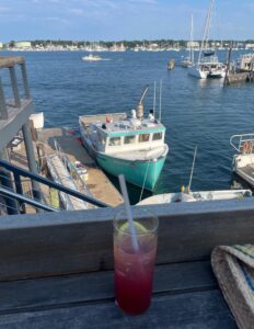 cocktail with a harbor view at Luke's Lobster