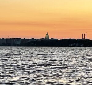sunset over the Wisconsin Capitol and Monona Lake